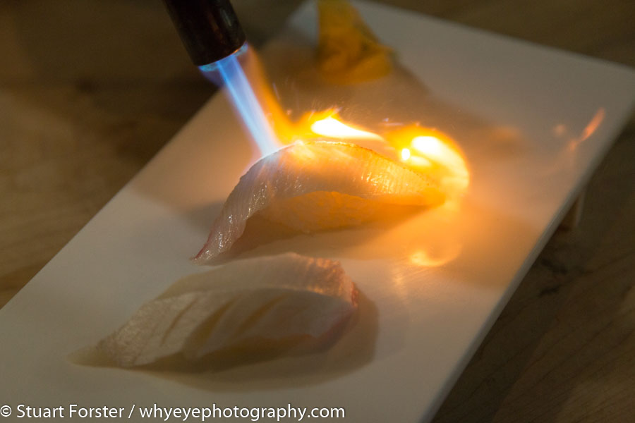 A quick blast of a blow torch to get the texture of sashimi just right.