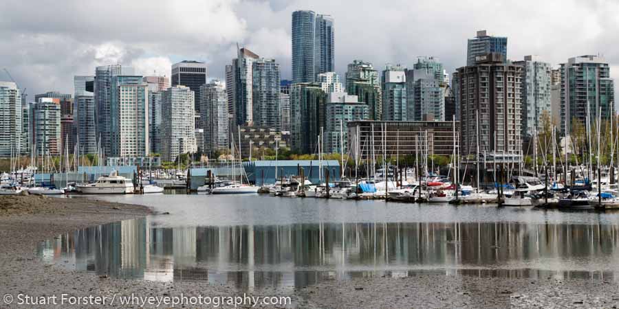 High-rise buildings of the Vancouver skyline seen across Devonian Harbour in British Columbia, Canada.