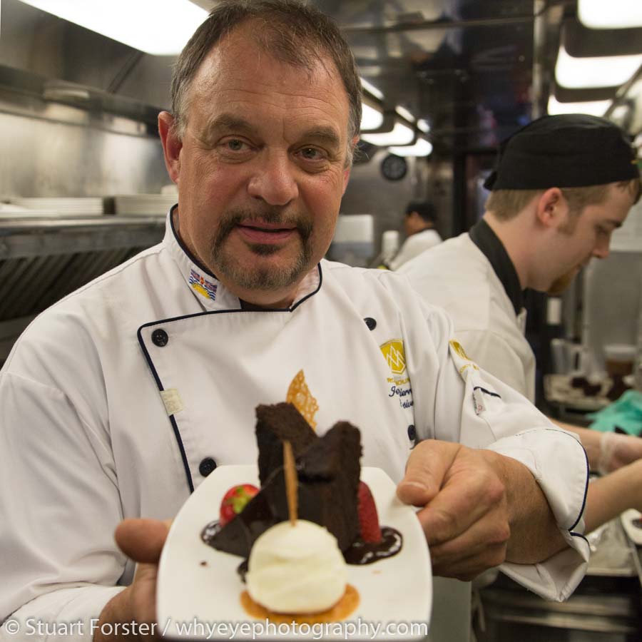 Executive Chef Jean-Pierre Guerin at work on the Rocky Mountaineer's galley kitchen.