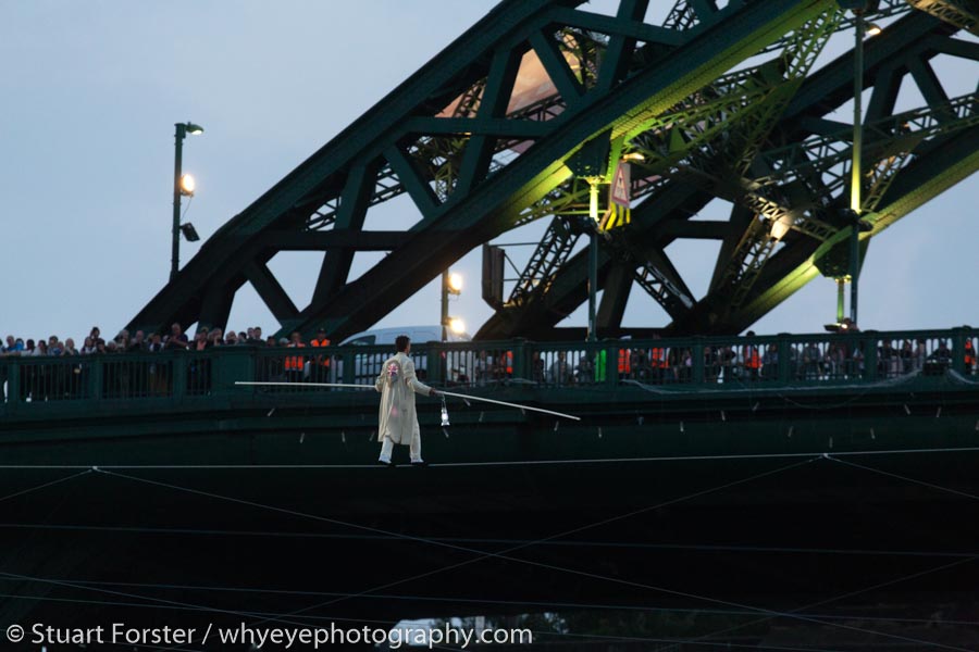 Members of Cirque Bijou performed a high-wire act, walking above the River Wear to Wearmouth Bridge in Sunderland, England, during the 2018 Tall Ships Race.