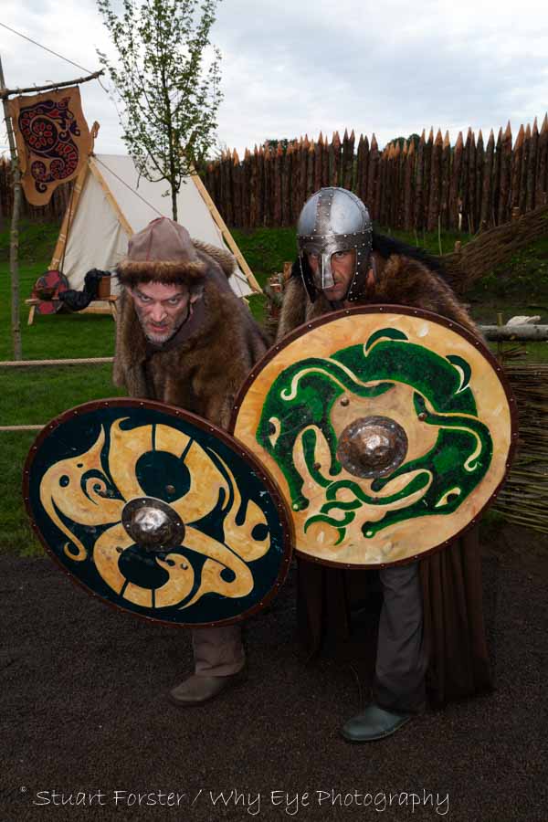 Men playing Vikings form a shield wall and look fierce in the Viking Village at Kynren in Bishop Auckland