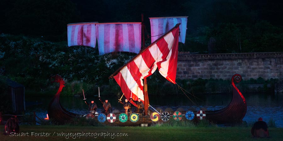 A Viking longship emerges during a performance of Kynren in County Durham.