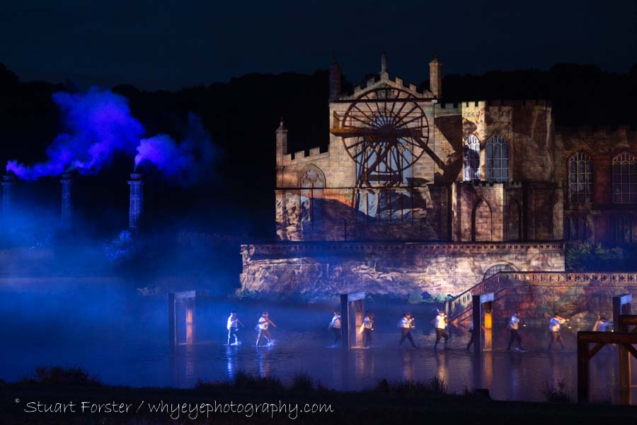 Chimneys and coal mining is depicted during a performance of Kynren at Bishop Auckland
