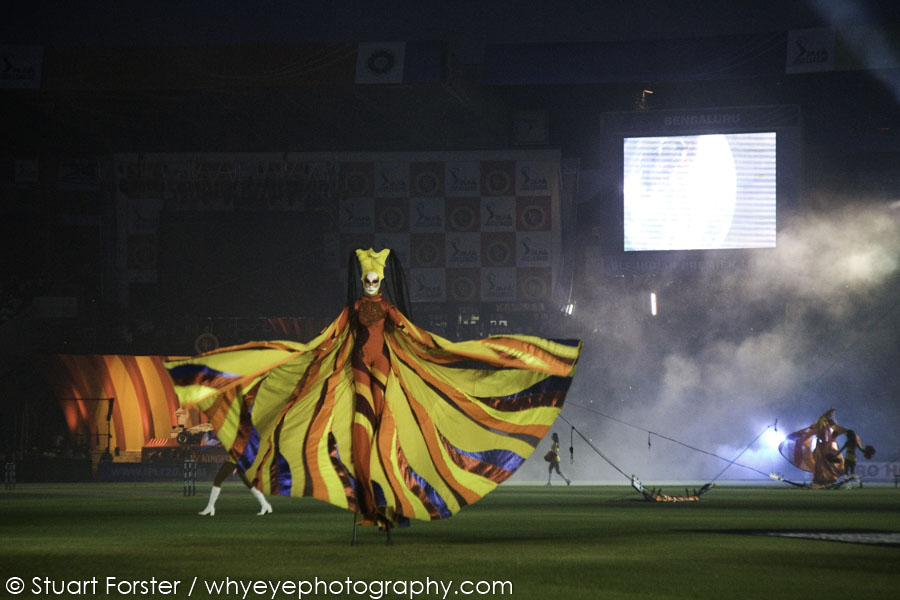 A stiltwalker provides part of the entertainment in Bangalore at the opening ceremony of the Indian Premier League (IPL).