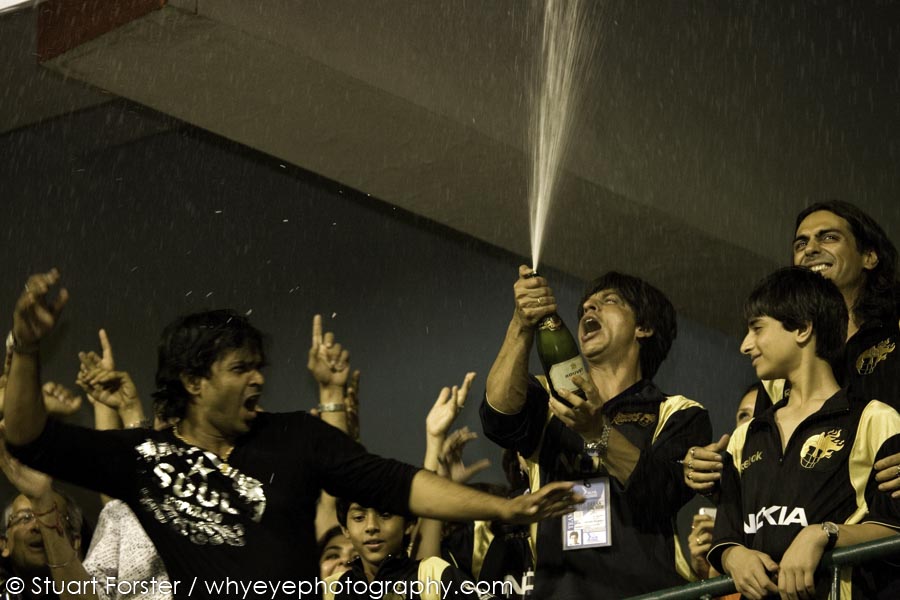 A Champagne moment? Movie star Shah Ruhk Khan pops a bottle of bubbly to celebrate the Kolkata Knight Riders victory in the opening IPL game.
