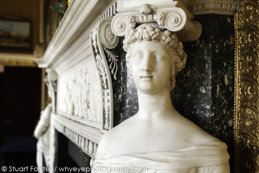 Sculptured figure on a fireplace in Brocket Hall, a historic mansion in Hertfordshire, England