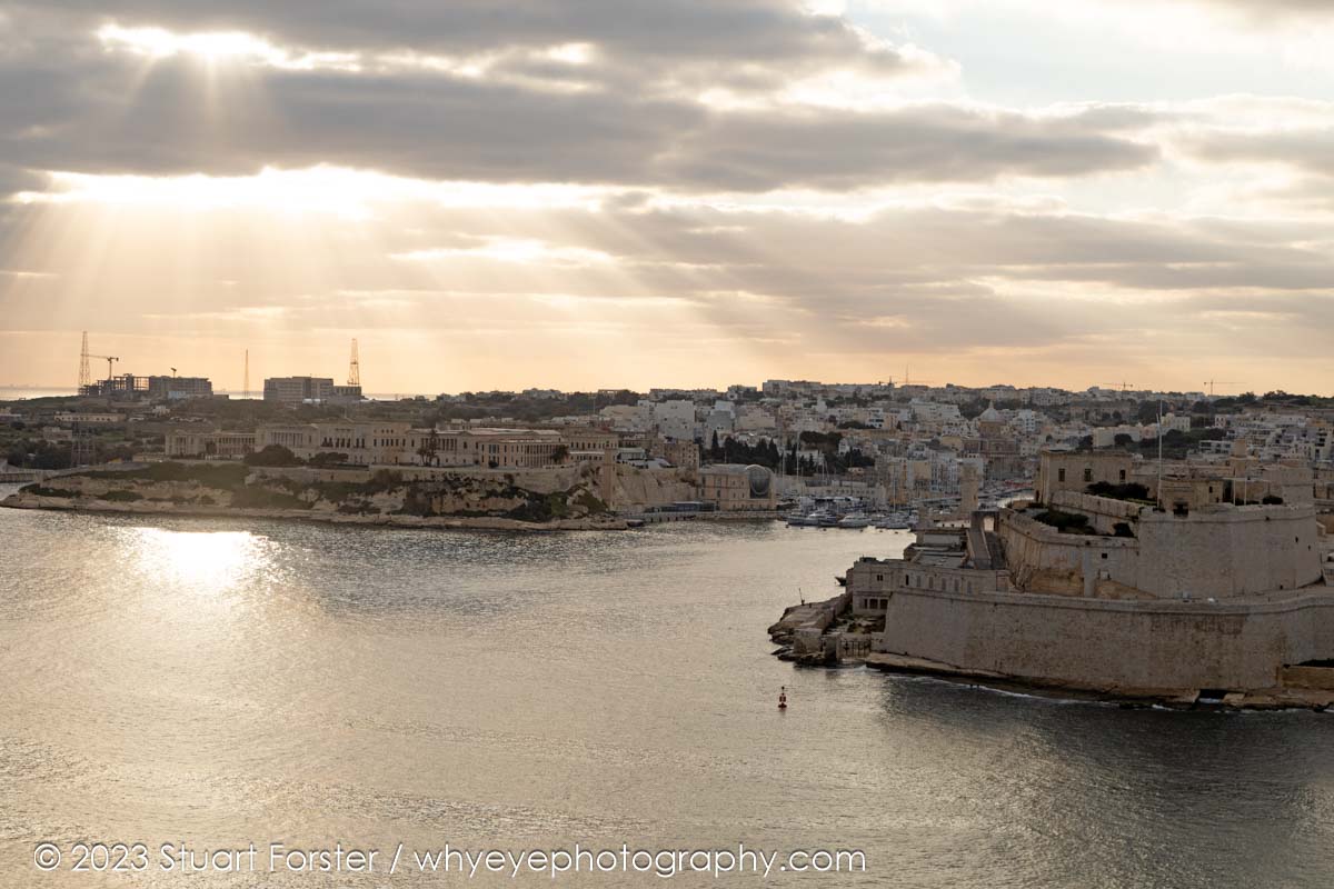 Sunrise over the Grand Harbour of Malta. The three cities of Birgu, Senglea and Cospicua lie across from Valletta.